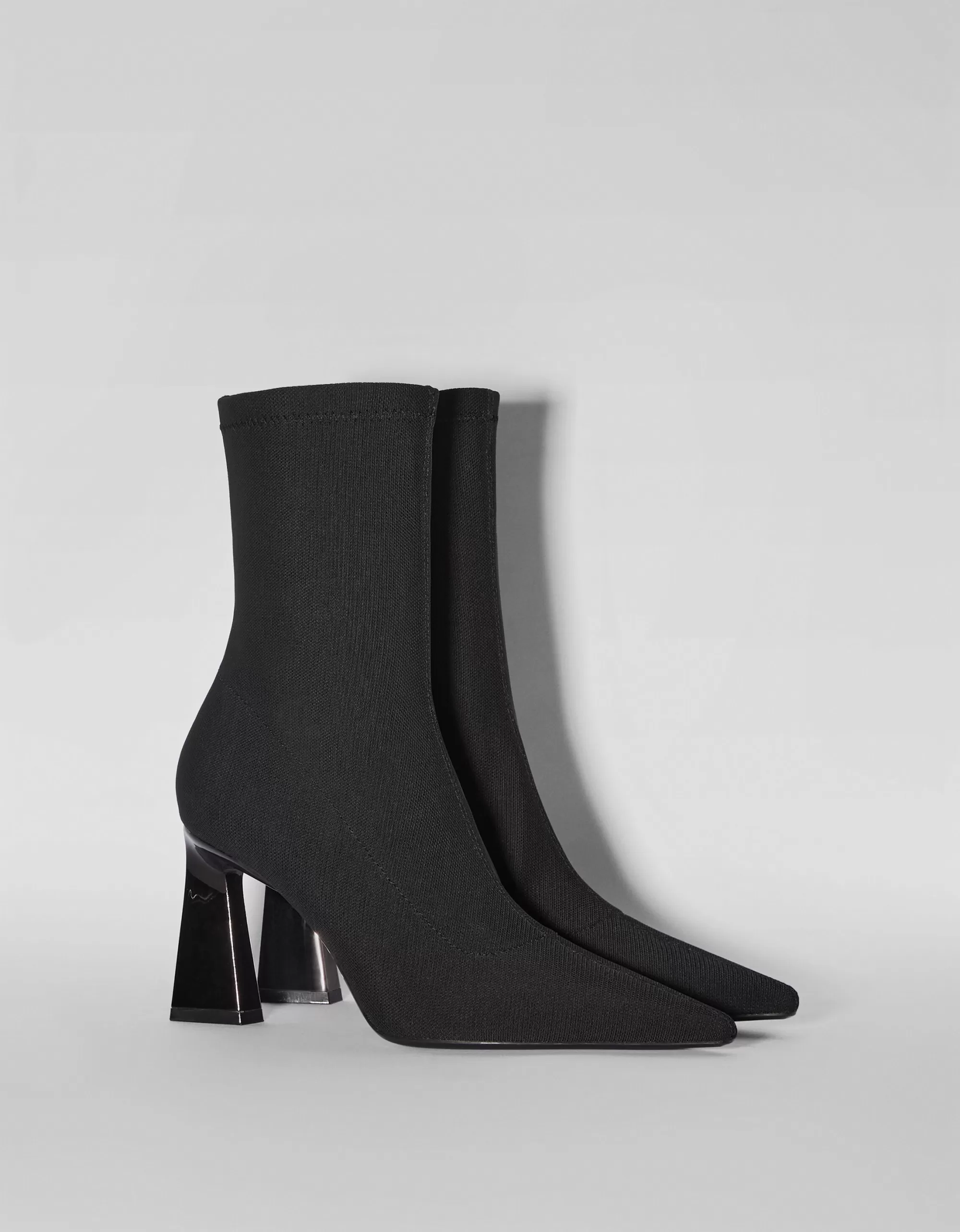 MUJER BERSHKA Botines ajustados tacón cromado