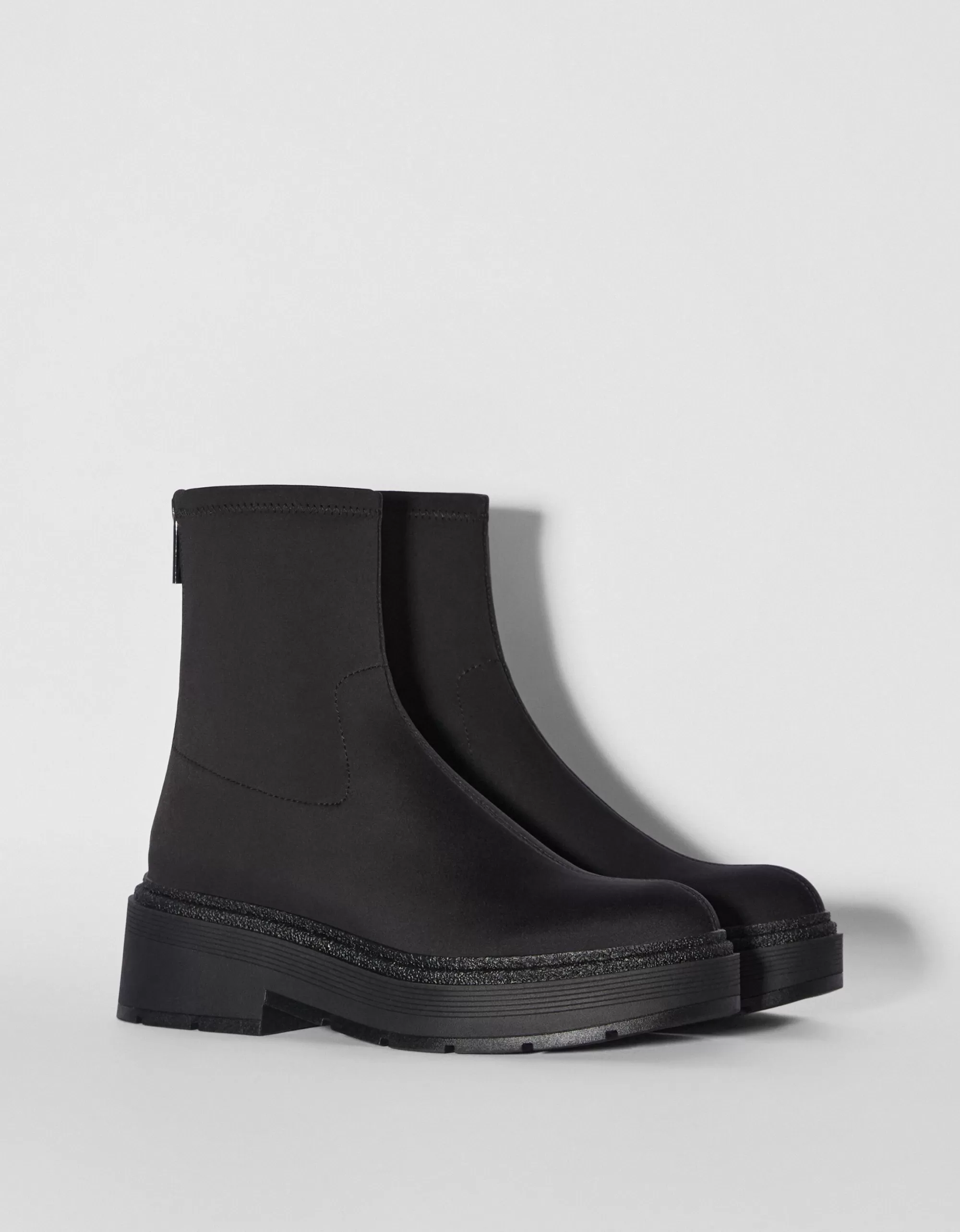 MUJER BERSHKA Botines planos ajustados