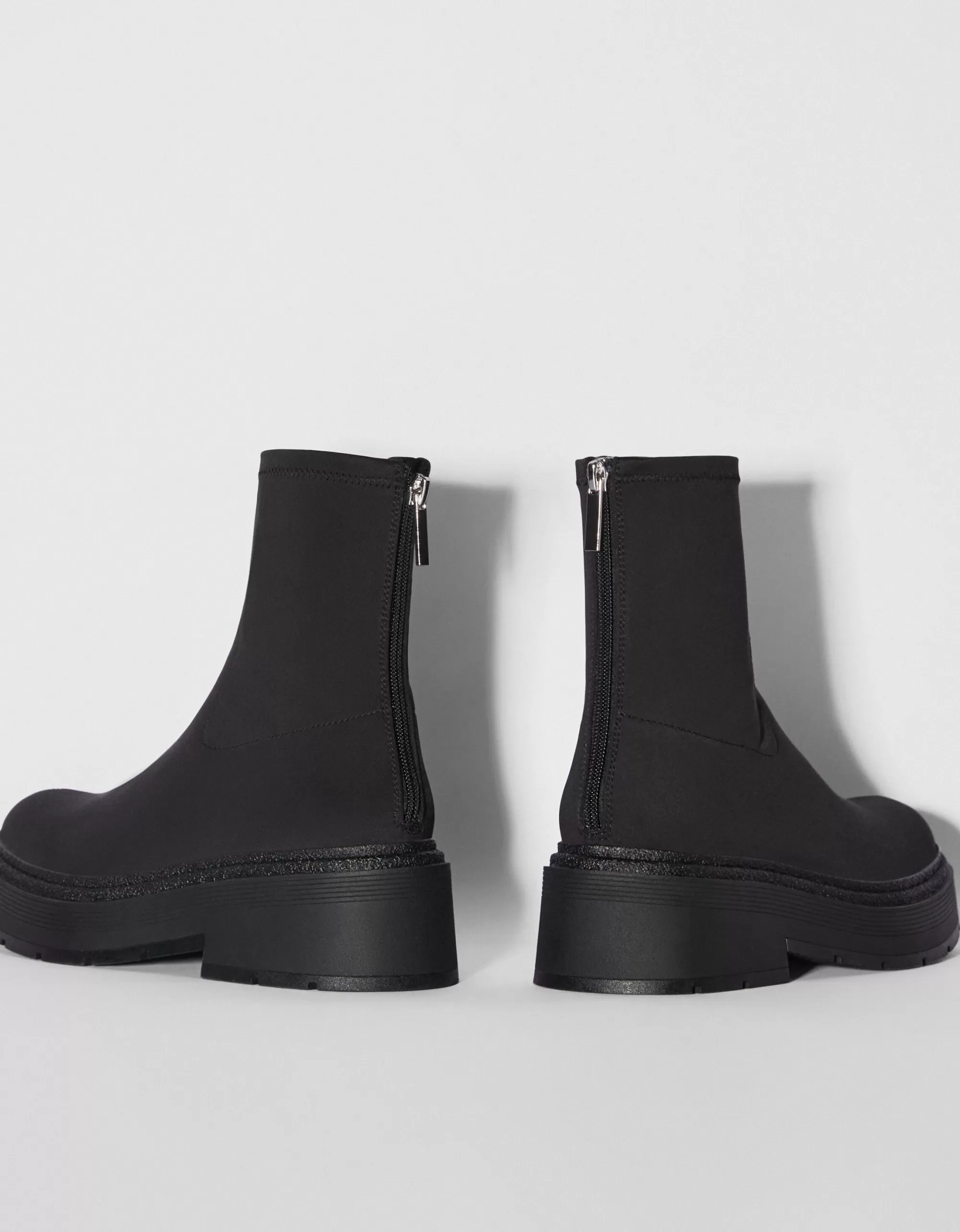 MUJER BERSHKA Botines planos ajustados