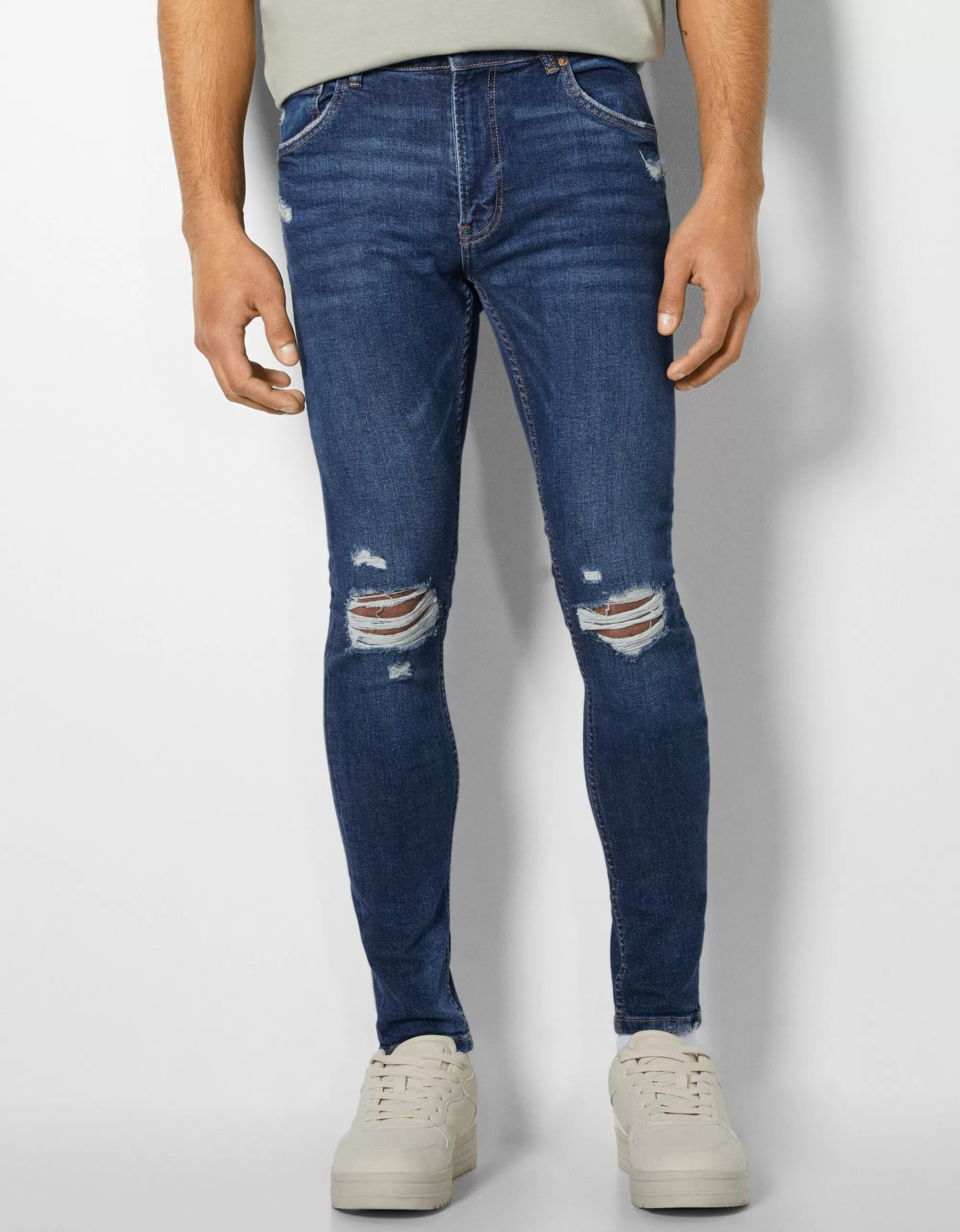 HOMBRE BERSHKA Jeans super skinny rotos