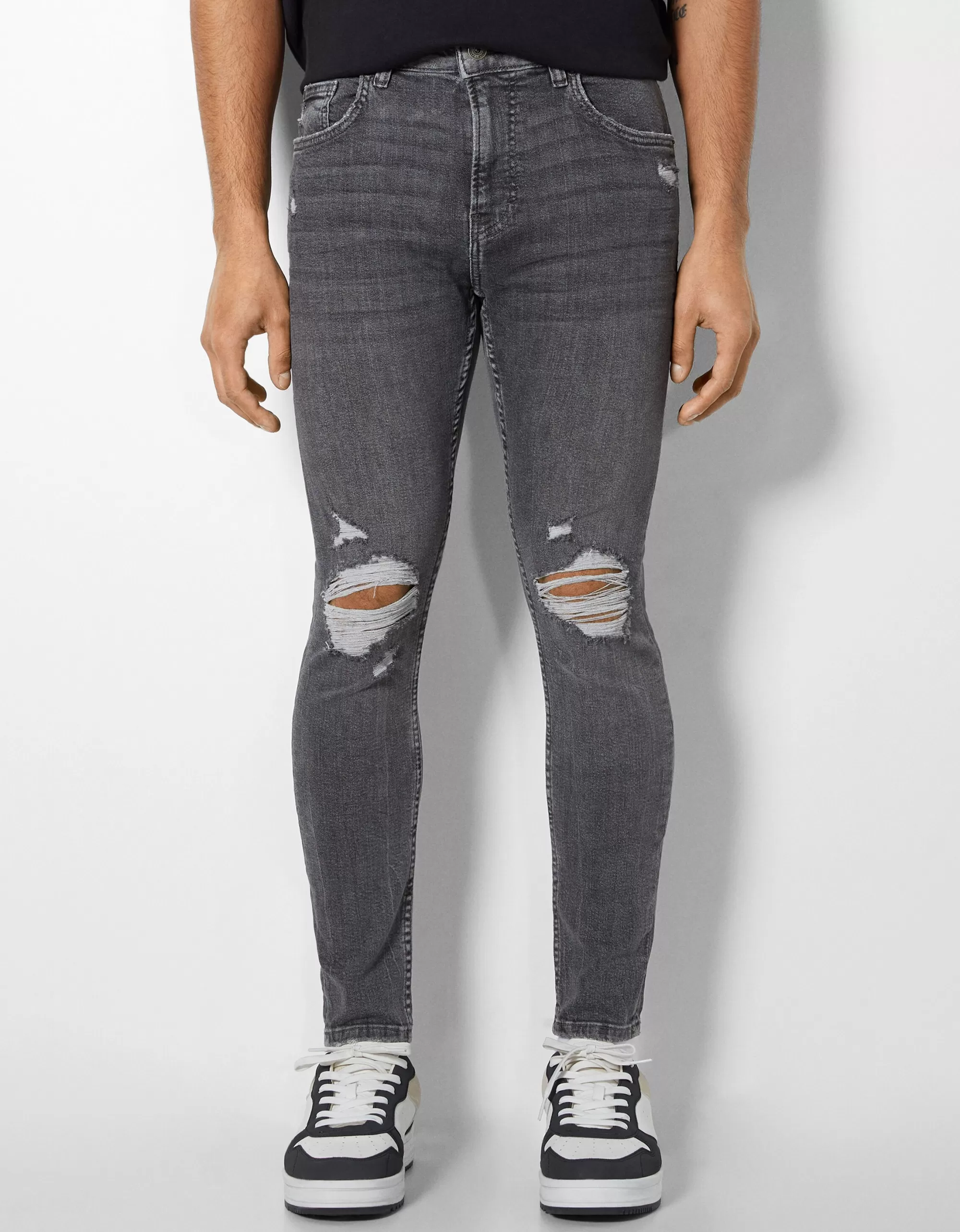 HOMBRE BERSHKA Jeans super skinny rotos