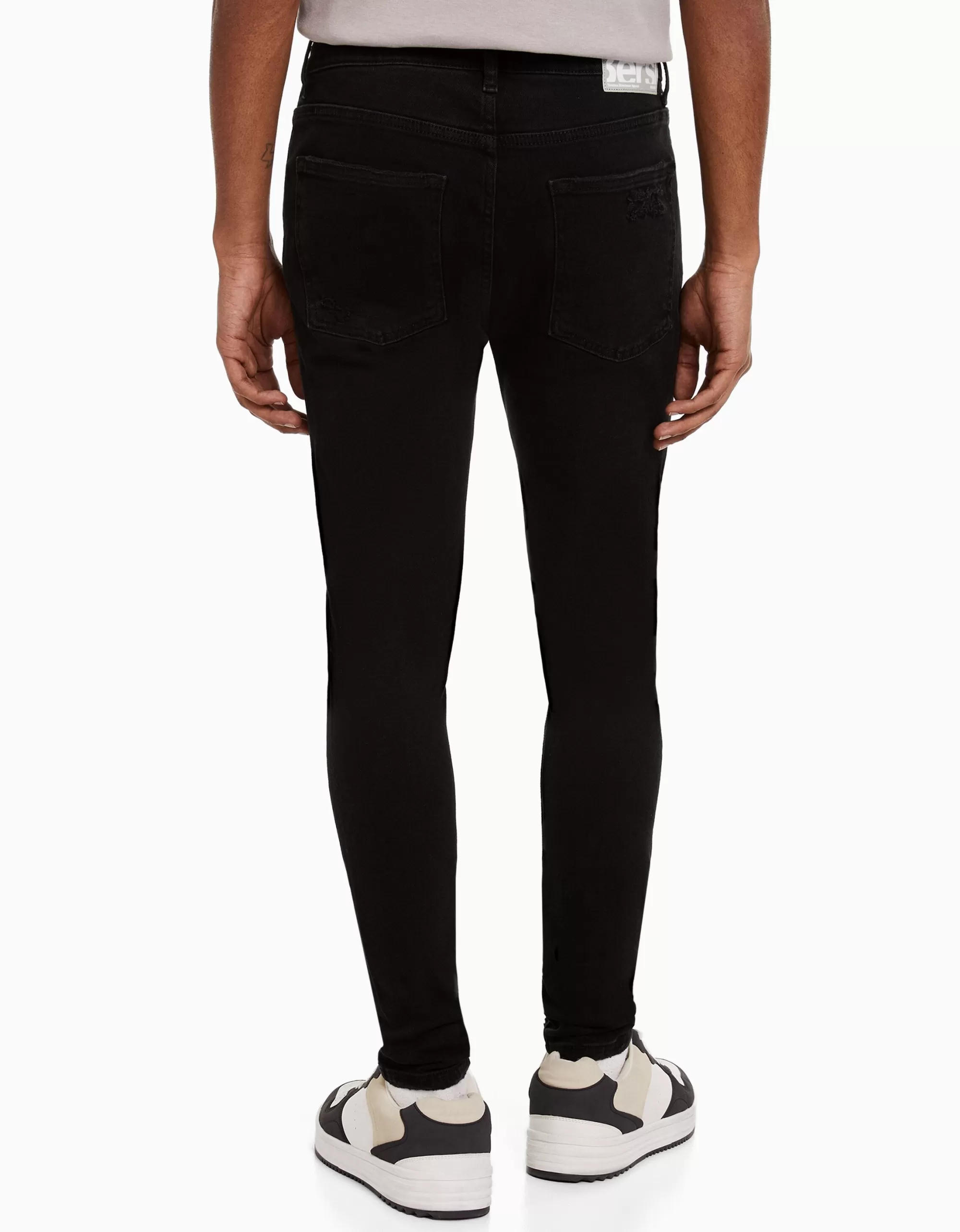 HOMBRE BERSHKA Jeans super skinny rotos