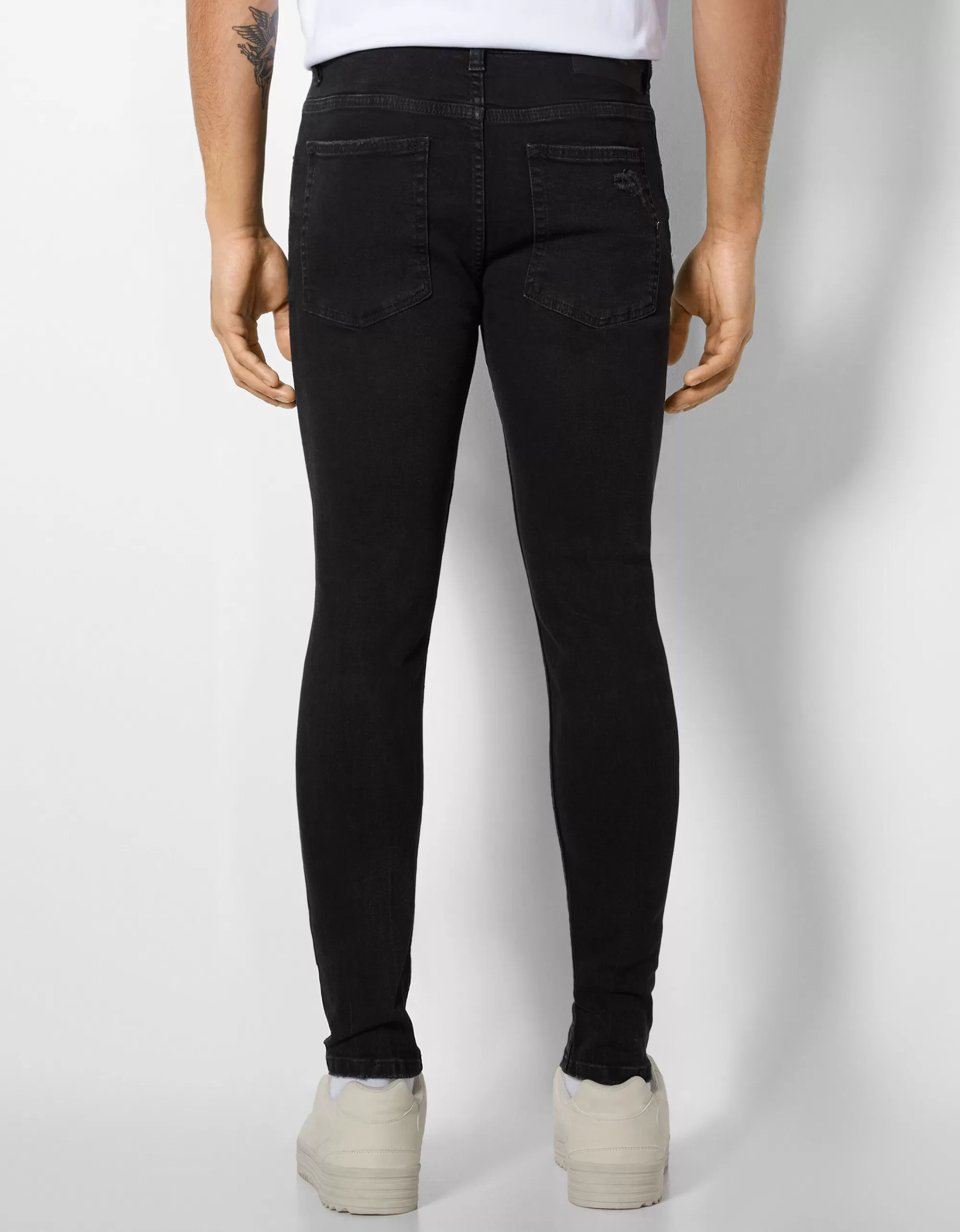 HOMBRE BERSHKA Jeans super skinny rotos