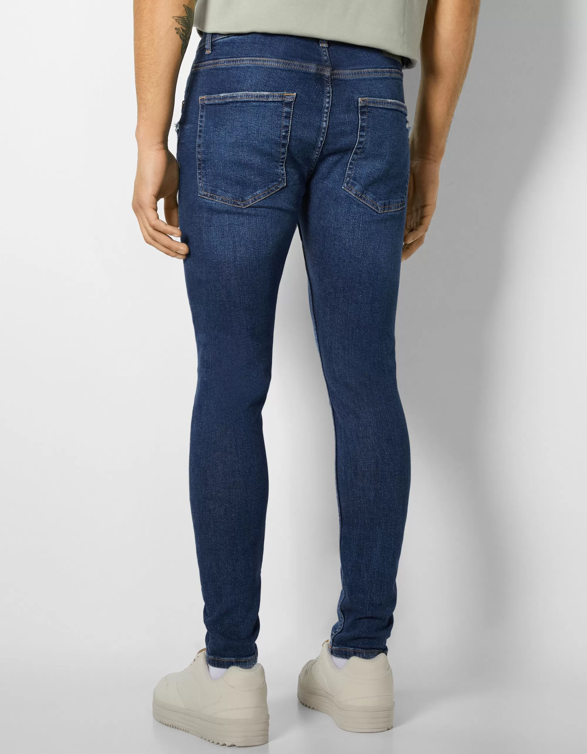HOMBRE BERSHKA Jeans super skinny rotos