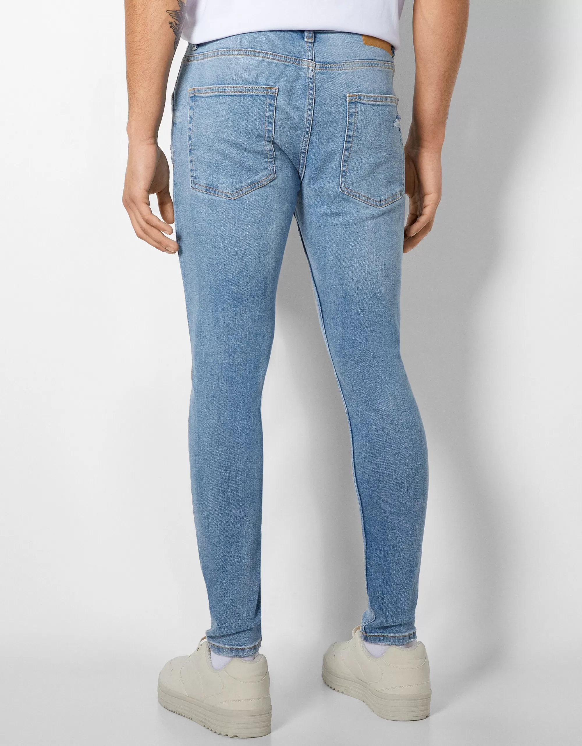 HOMBRE BERSHKA Jeans super skinny rotos