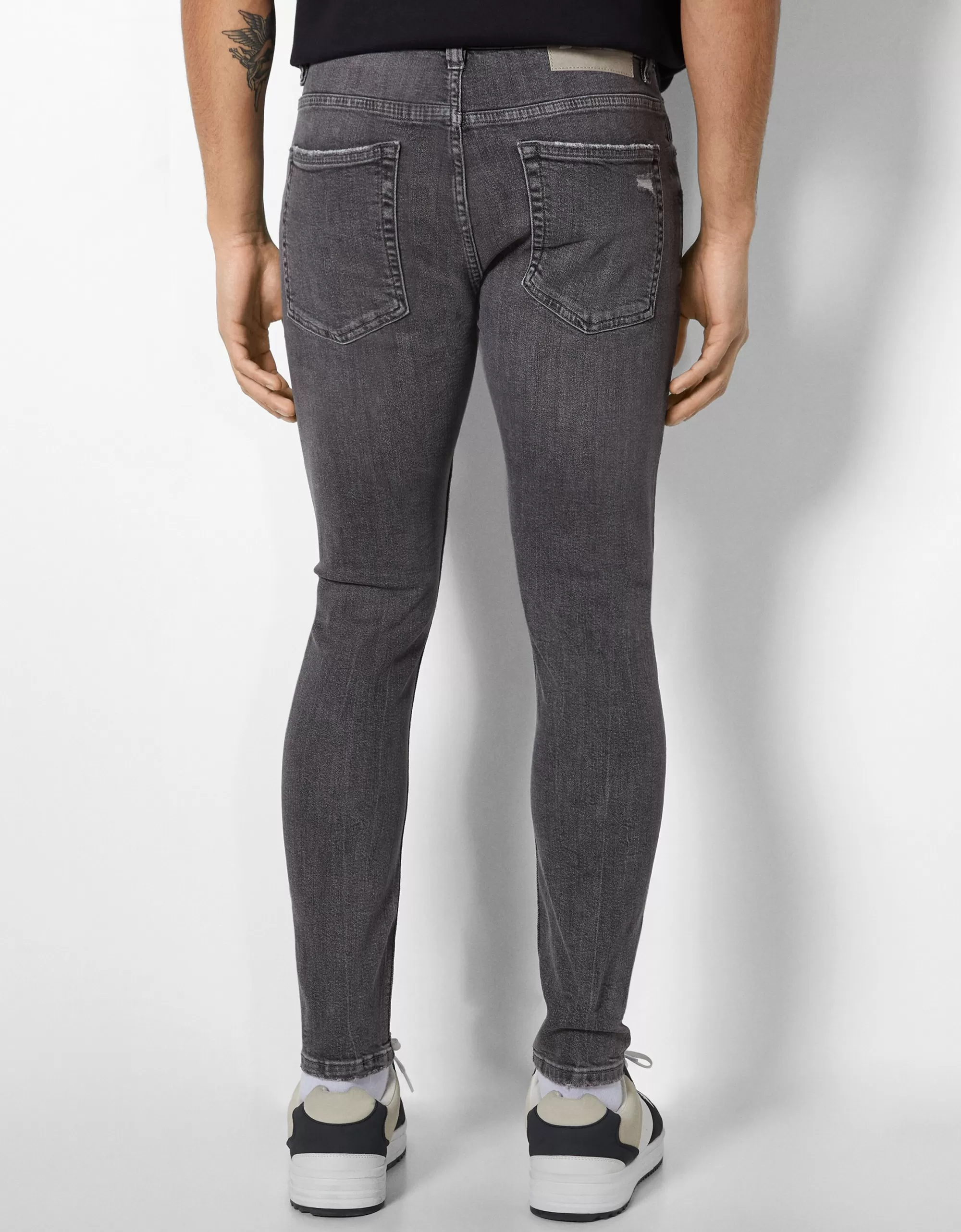 HOMBRE BERSHKA Jeans super skinny rotos