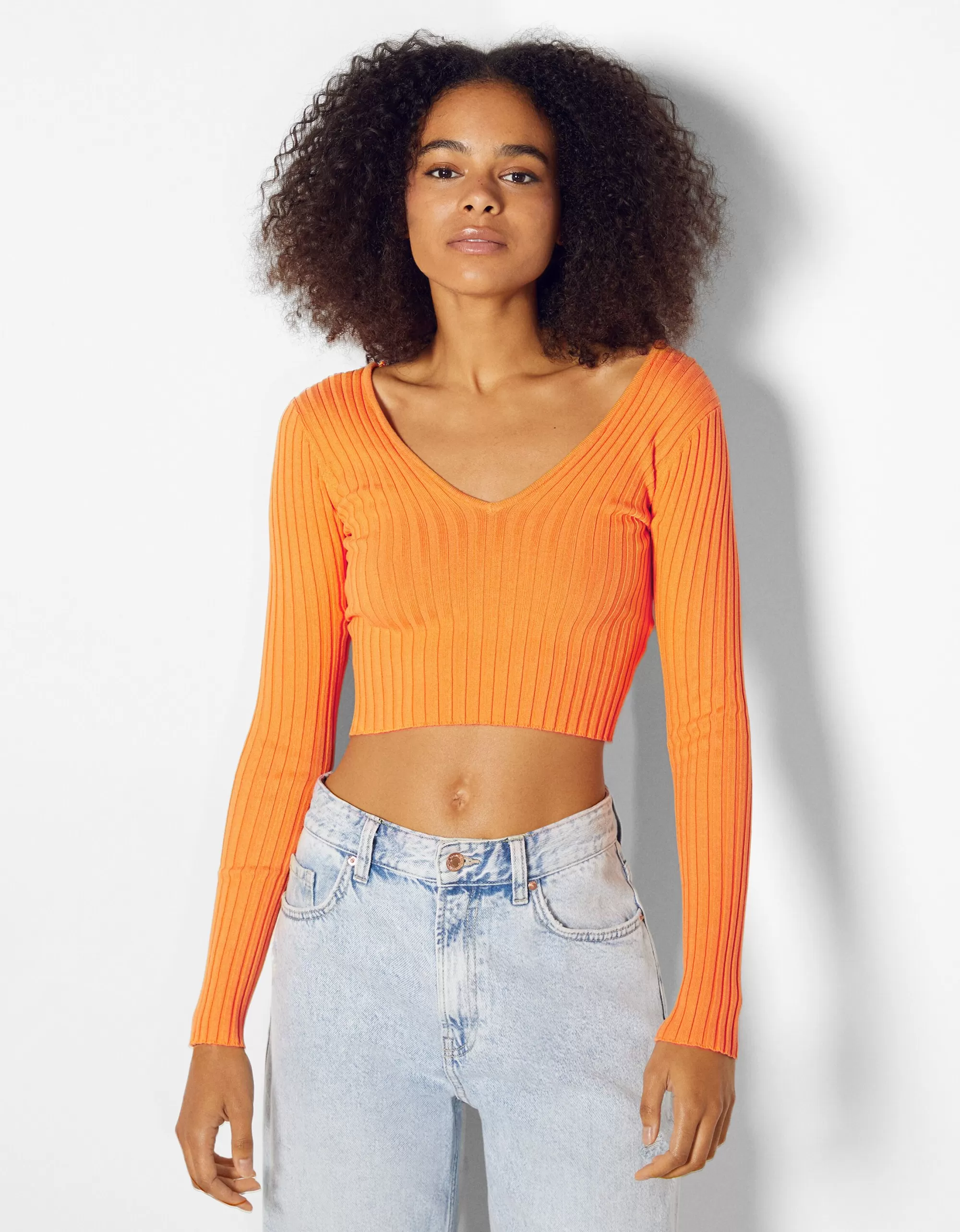MUJER BERSHKA Jersey cuello pico rib