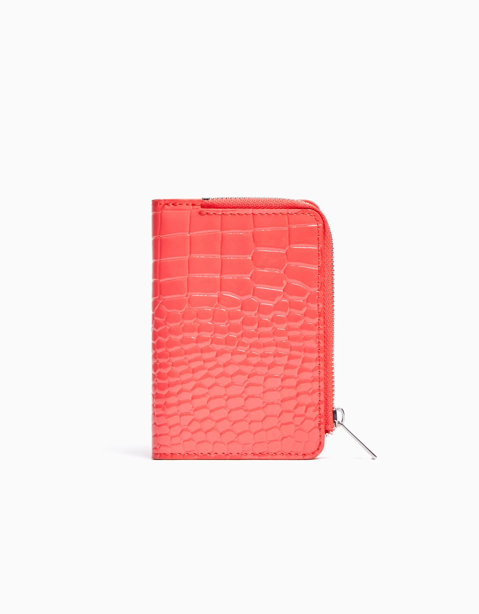 MUJER BERSHKA Monedero efecto charol grabado estampado animal