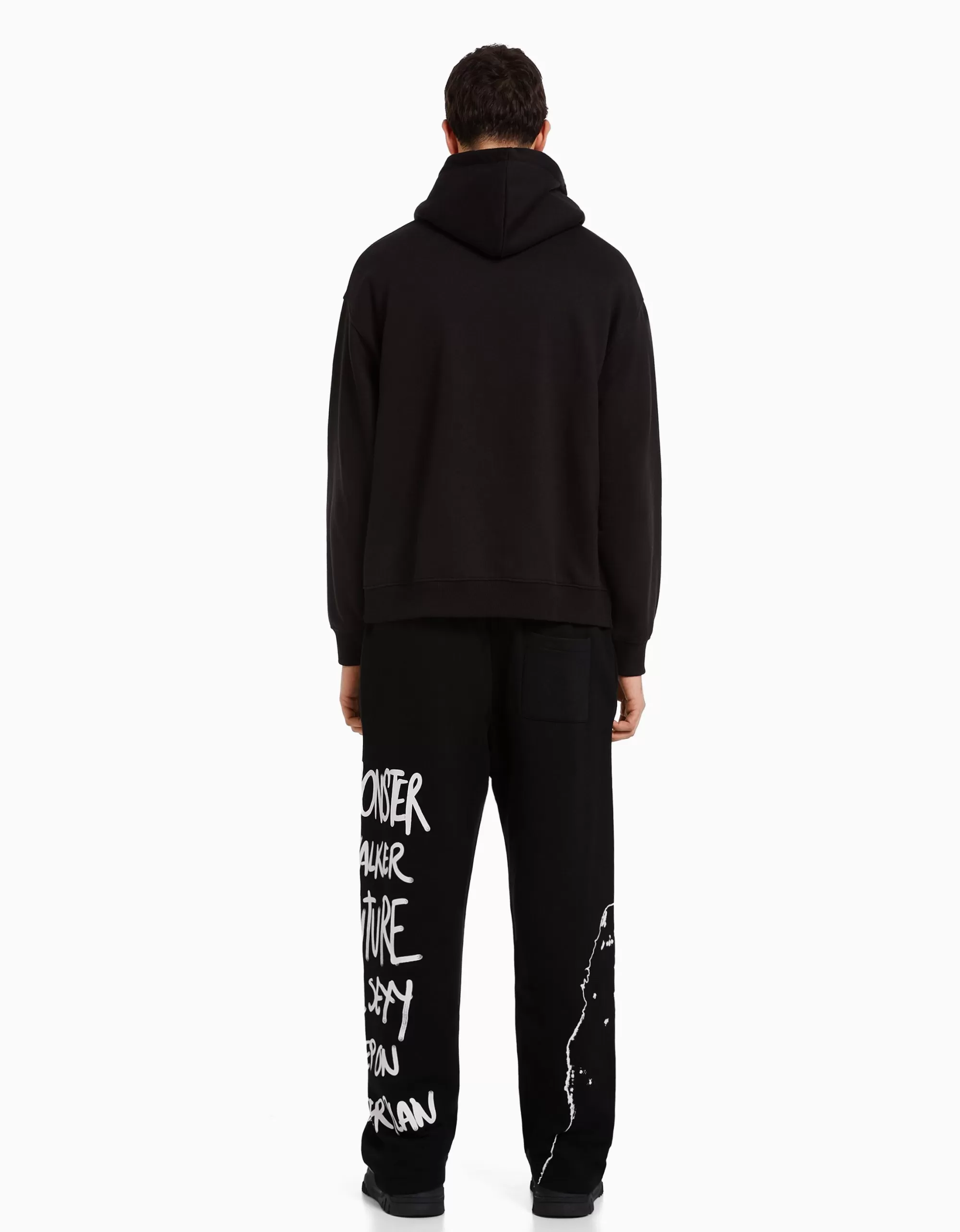 HOMBRE BERSHKA Pantalón felpa wide leg cintura elástica print