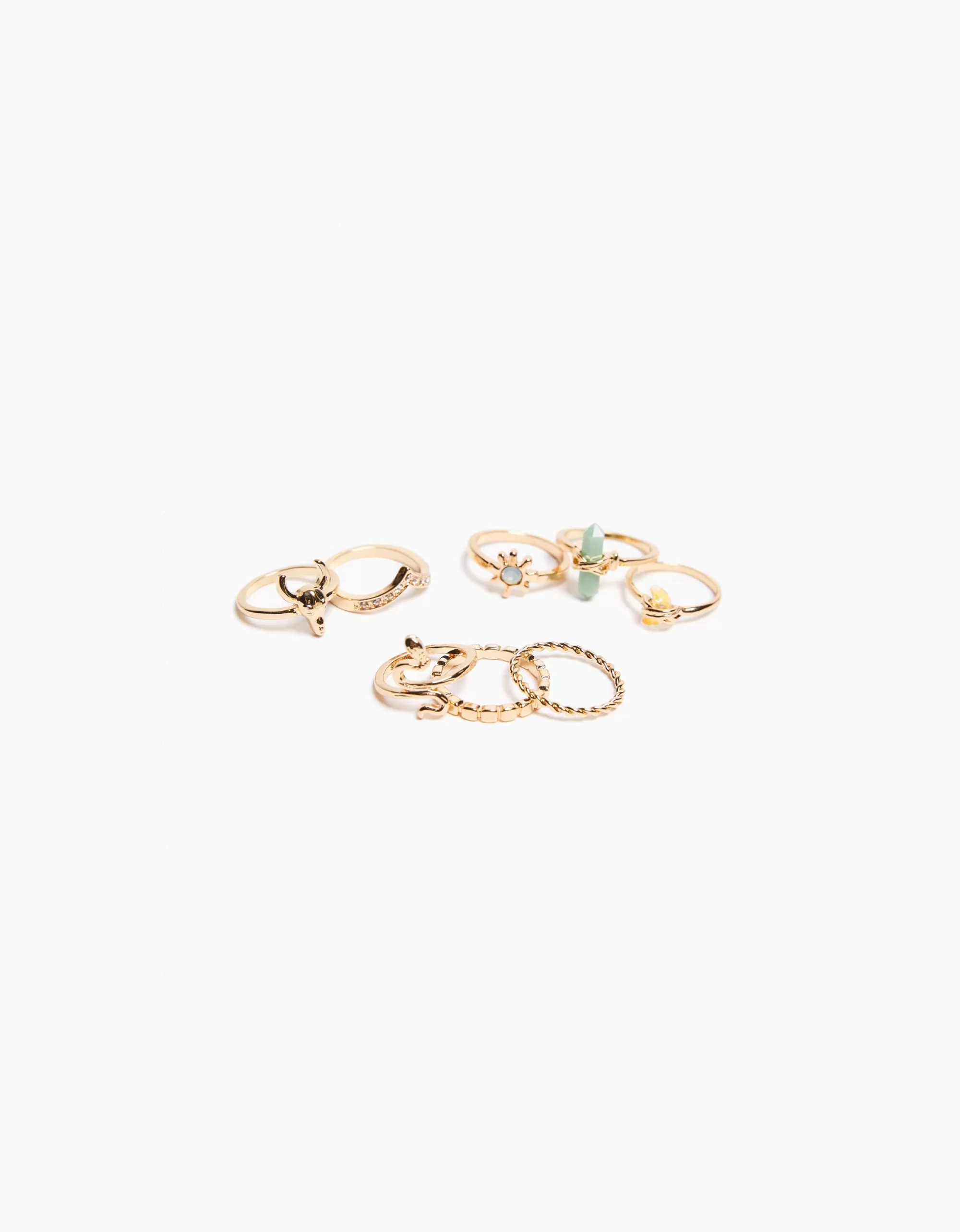 MUJER BERSHKA Set 8 anillos dorados pedrería serpiente