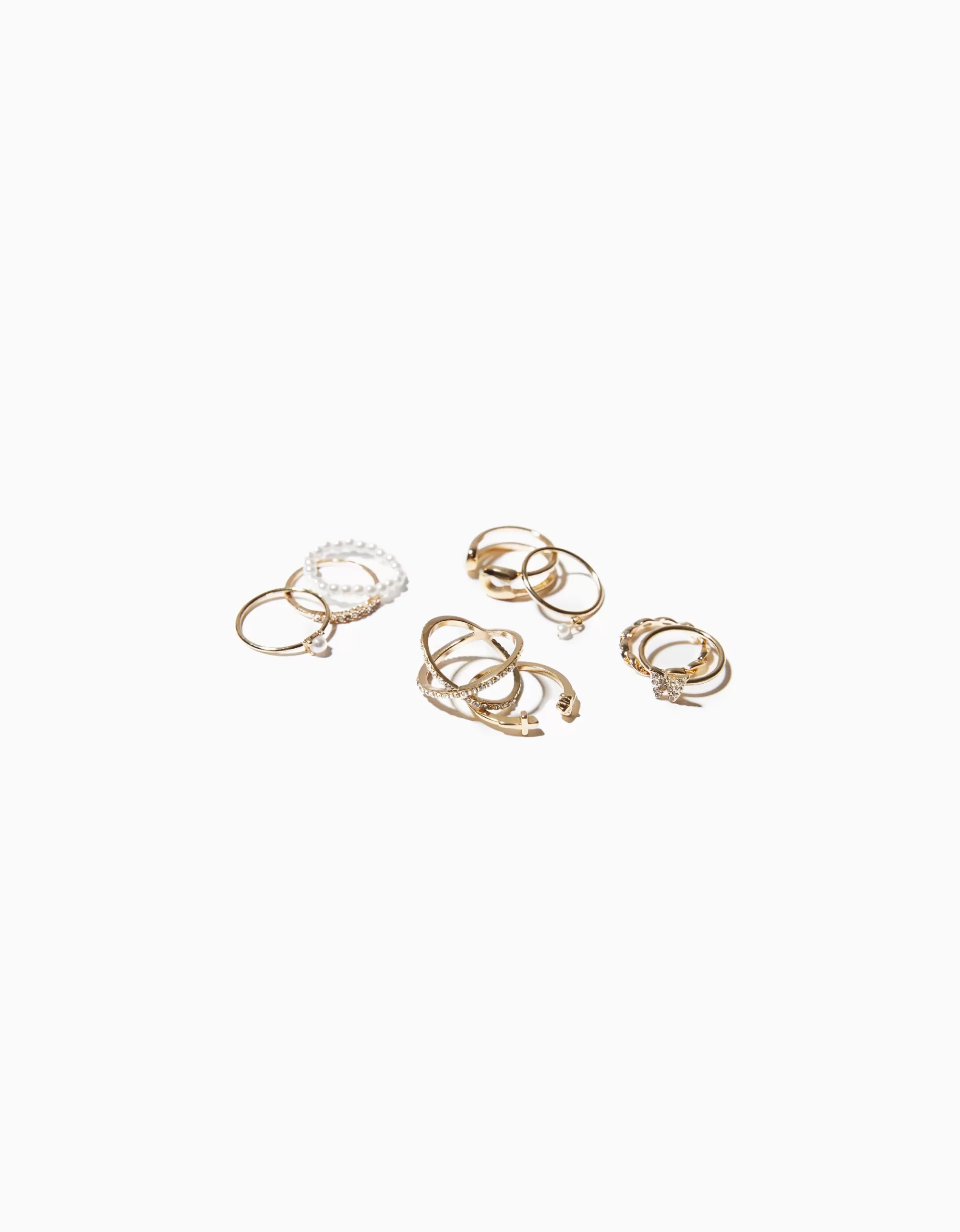 MUJER BERSHKA Set 9 anillos cruz mariposa