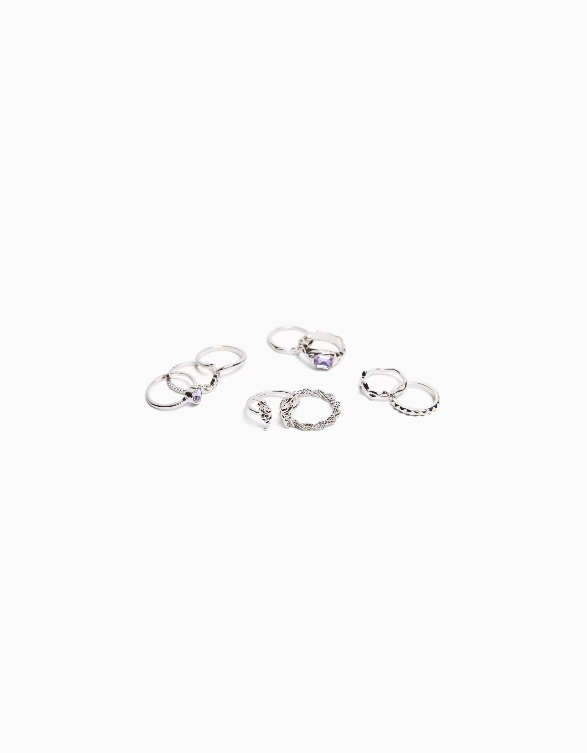 MUJER BERSHKA Set 9 anillos pedrería