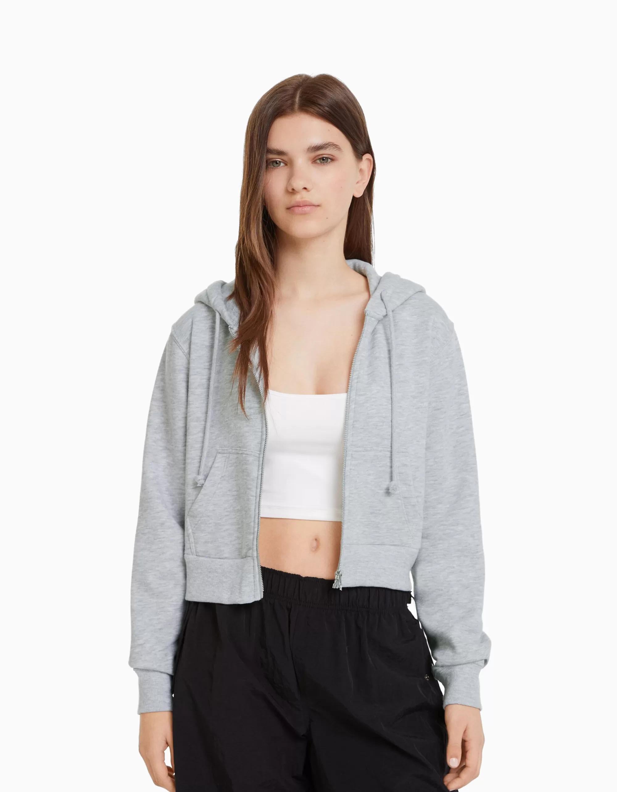 MUJER BERSHKA Sudadera cremallera capucha cropped